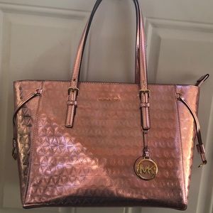 pink metallic michael kors purse